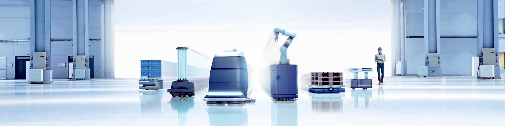Automated warehouse with mobile robots and a robotic arm